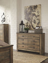 Trinell - Panel Bedroom Set